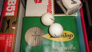 A collection of golf balls,