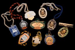 Seven groups of Sandown Park badges, one for each of the years 1970 to 1976, inclusive,