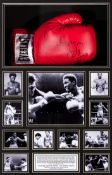 A signed Thomas "The Hitman" Hearns boxing glove presentation,