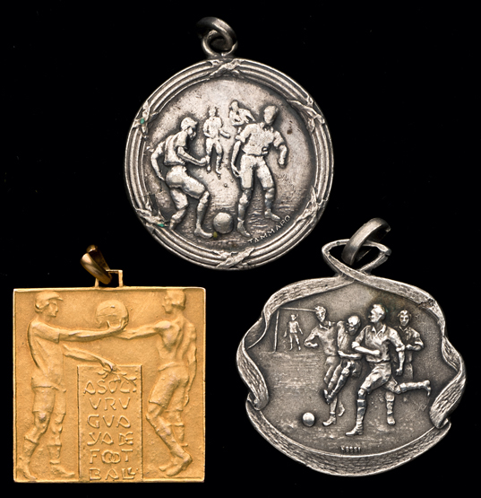 A trio of medals awarded to Juan Peregrino Anselmo, i) gilt-metal medal from the Uruguayan F.A.