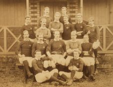 An original sepia-toned photograph of the Scottish international rugby team of 1887, mounted,