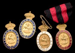 A group of four 1884 Sandown Park badges, consisting of a gentleman's badge, numbered 934,