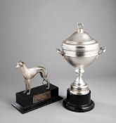 The 1976 Greyhound Derby Trophy won by Mutts Silver, a silver trophy cup & cover,
