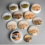 A collection of racing-themed Staffordshire pot lids,