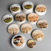 A collection of racing-themed Staffordshire pot lids,