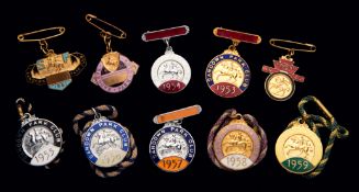 Ten groups of Sandown Park badges, one for each of the years 1950 to 1959, inclusive,