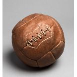 A vintage 12-panel leather football circa 1930, brown leather,