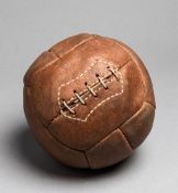 A vintage 12-panel leather football circa 1930, brown leather,
