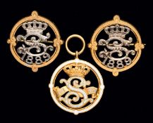 A matching trio of 1889 Sandown Park badges, consisting of a gentleman's and two ladies' badges,