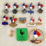 A group of 13 French Olympic Team pins dating between 1952 and 1996