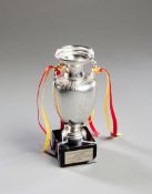 A miniature replica of the European Nations Cup trophy commemorating the win by Spain in 1964,