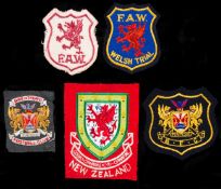 Five football shirt & blazer badges,