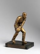A continental bronze figure of a skittles player,