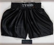 Mike Tyson signed boxing trunks,