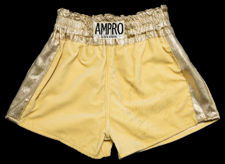 John Conteh signed boxing trunks, by Ampro of London, yellow with gold lame waistband and stripes,