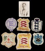 A group of six Fred Bullock representative football shirt badges,