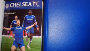 Two bound volumes containing all 19 home League programmes from Chelsea's triumphant 2014-15