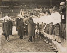 Original photograph of King George V shaking hands with the Huddersfield Town players before the
