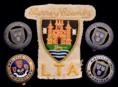 Five badges originally issued to Percy Rootham Vice President of the Lawn Tennis Association,