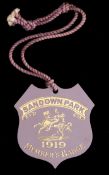 A 1919 Sandown Park badge, numbered '619' on the reverse,