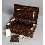 The travelling case of the jockey Steve Donoghue, vintage crocodile skin case,