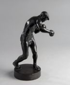 Soviet bronze figure of a boxer dated 1968, the boxer modelled having thrown a right hook,