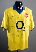 Yellow Arsenal replica jersey signed by the 2003-04 'invincibles' team,