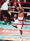 Photographs signed by the boxers Riddick Bowe, Tim Witherspoon & Buster Douglas, large 12 by 16in.