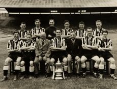 An official photograph of the Newcastle United 1950-51 F.A. Cup winning team, a 7 1/2 by 9 1/2in.
