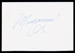 A Muhammad Ali autographed card,