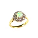 18 ct yellow gold opal and diamond cluster ring.