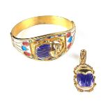 Silver gilt and enamel scarab bangle and matching pendant.