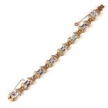 An exceptional 18 ct yellow and rose gold aquamarine bracelet.