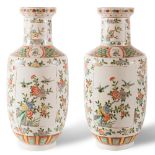 Couple of big vases decorated with floral motifs, trademark of Kangxi period, China, H cm 43