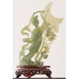 Jade sculpture depicting “Danzatrice sotto la luna”, wooden base, 20th Cerntury, China, H cm 29