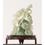 Jade sculpture, wooden base, 20th Cerntury, China, H cm 20