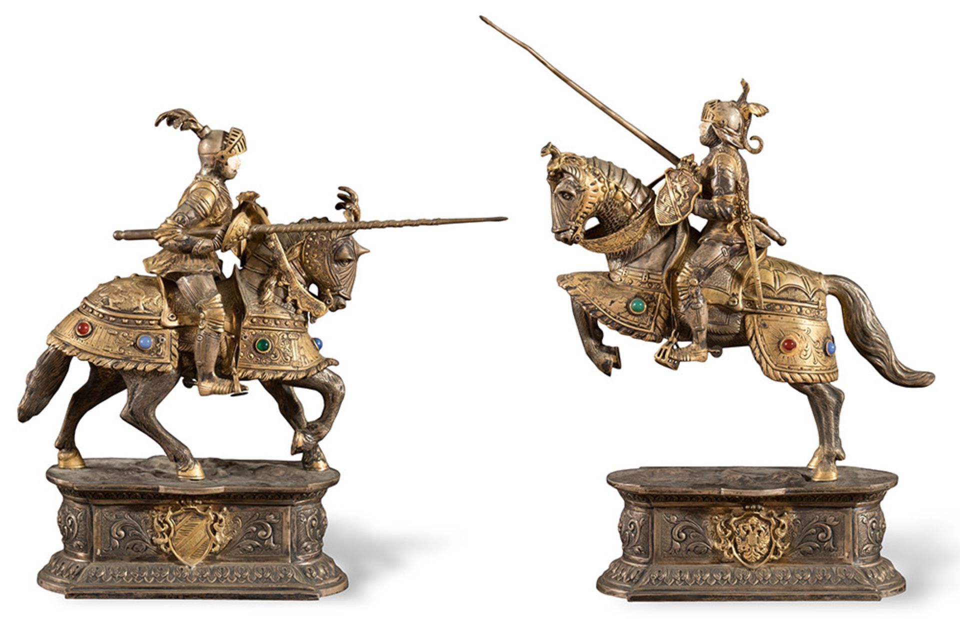Pair of silver sculptures depicting Jousting Knights on Horseback