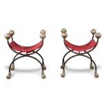 Pair of iron and gilt bronze 'faldistorio' chairs, 19th Century