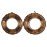 Pair of round frames, ebonized and lacquered wood, Marche, late 17th Century