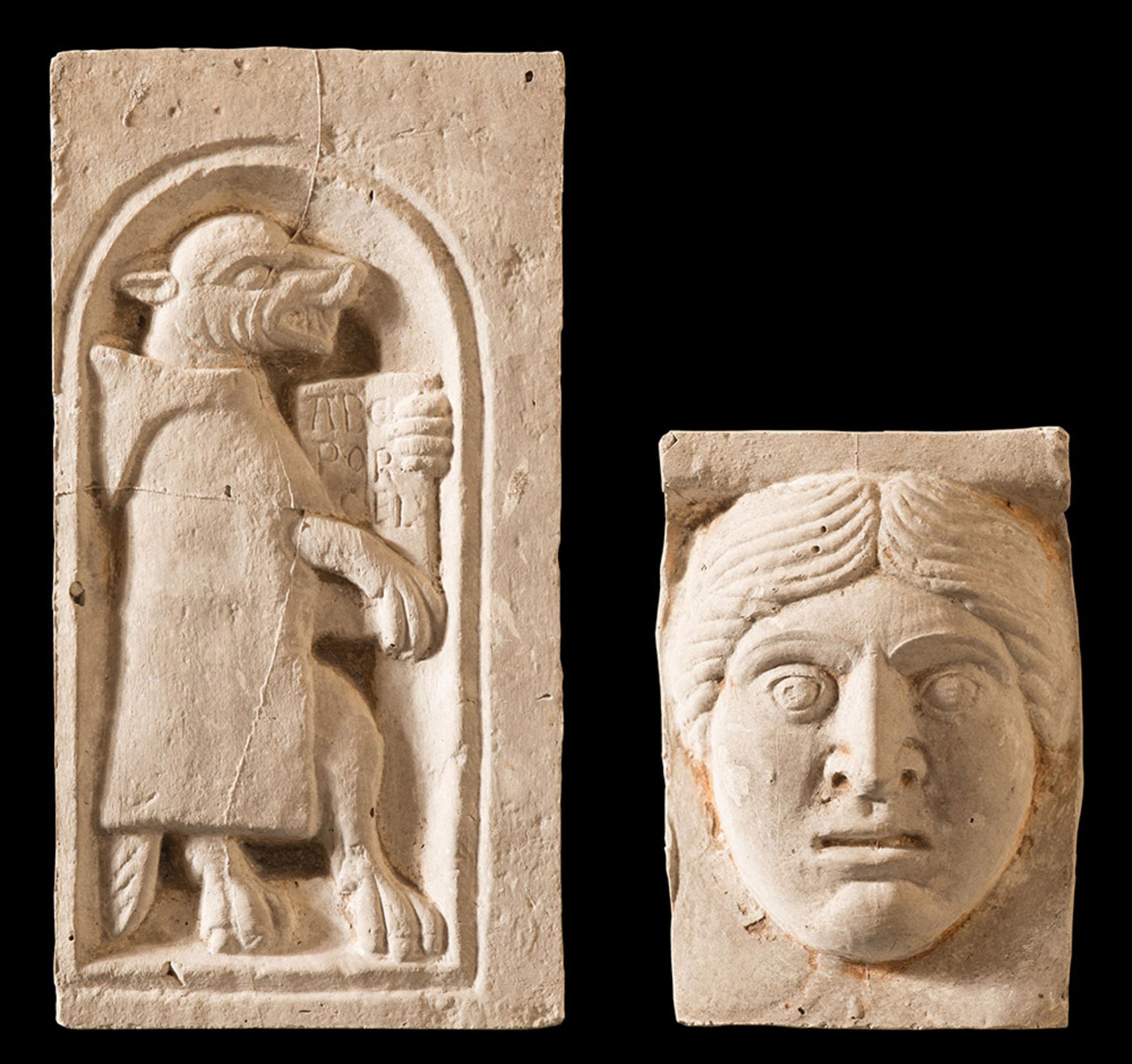 Pair of plaster casts of the 20th Century, "Figura zoomorfa" and "Testa di figura antropomorfa"