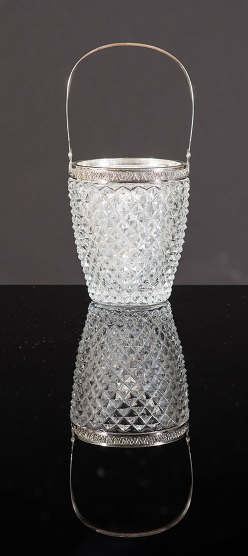 Silver and crystal ice bucket.