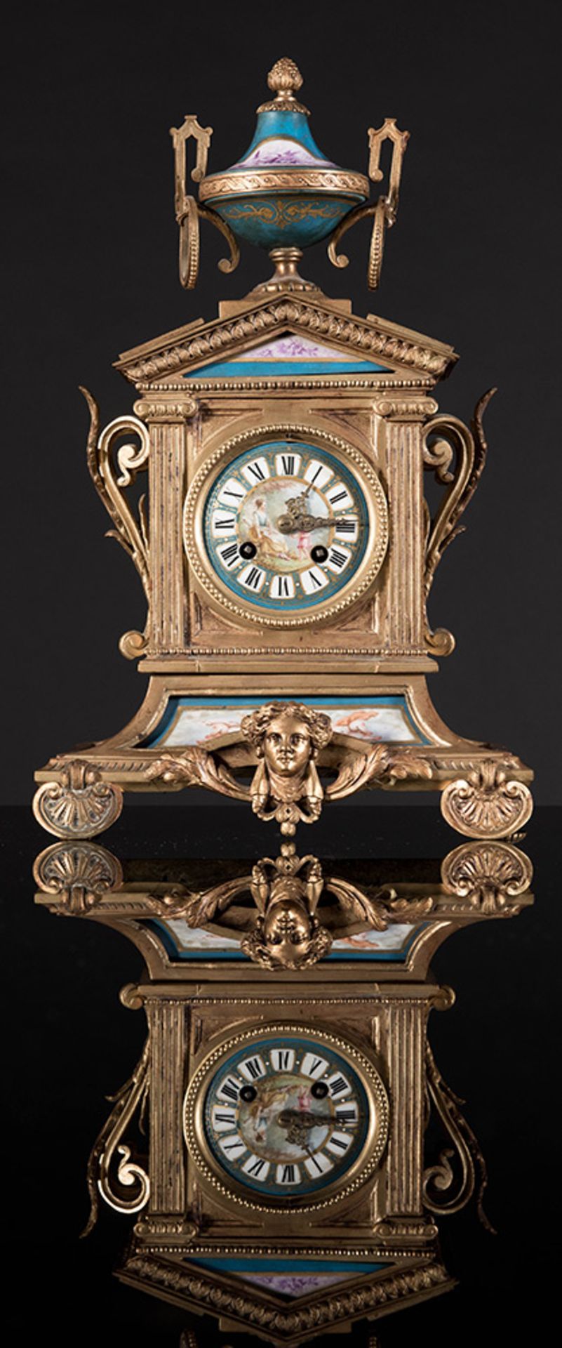 Gilt bronze and Sévres porcelain plaques mantel clock.