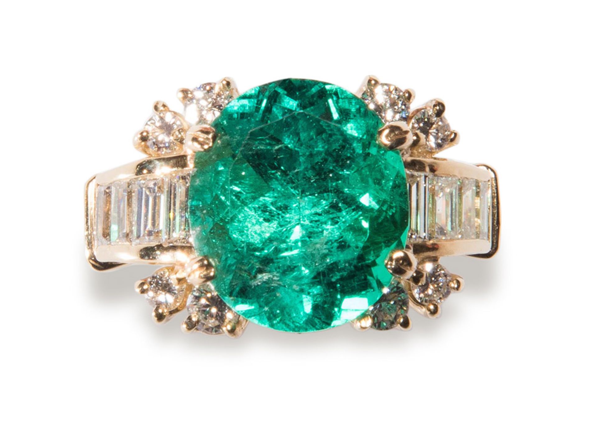 Emerald and diamond ring.