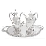 Silver service with tray, caffee pot, tea pot, milk pot and sugar bowl.