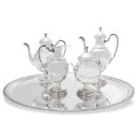 Silver service with tray, caffee pot, tea pot, milk pot and sugar bowl.