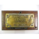 Cheshire Lines Handlamp location plate “CHESHIRE LINES CHORLTON”. A brass label with scalloped