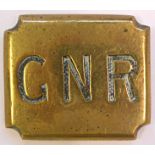 Great Northern Railway horse brass (oblong) with scalloped corners with the letters “GNR” heavily