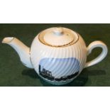 A commemorative one cup tea pot “A PRESENT FROM DARLINGTON” in script to the side of the body and