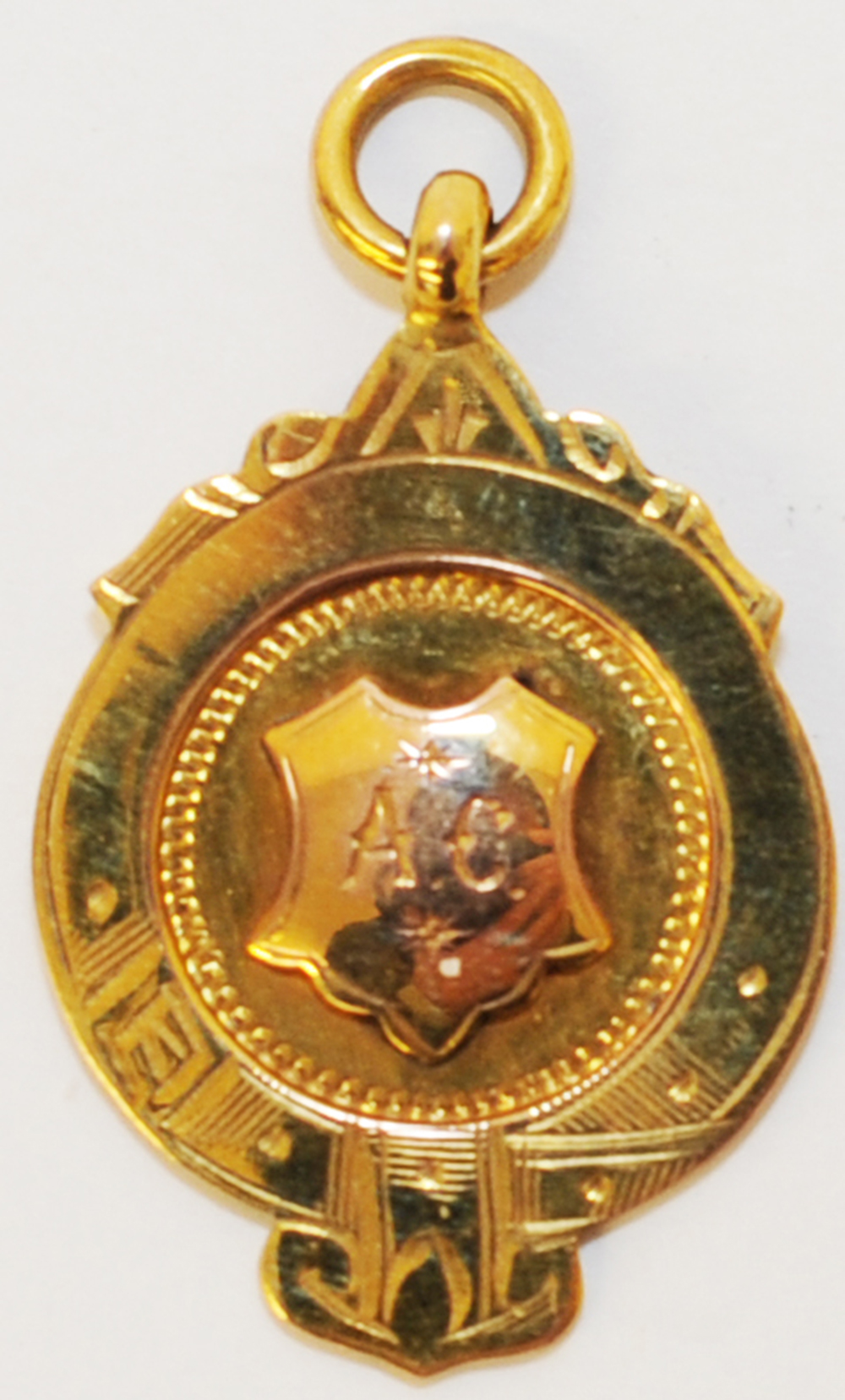 LNER 9ct gold FC Medal PHH Champions 1930/31 with initials 'AC' on a plain face.