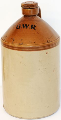 GWR large Stoneware Flagon complete with stopper. Measures 16in tall and 9in diameter. Small chip to
